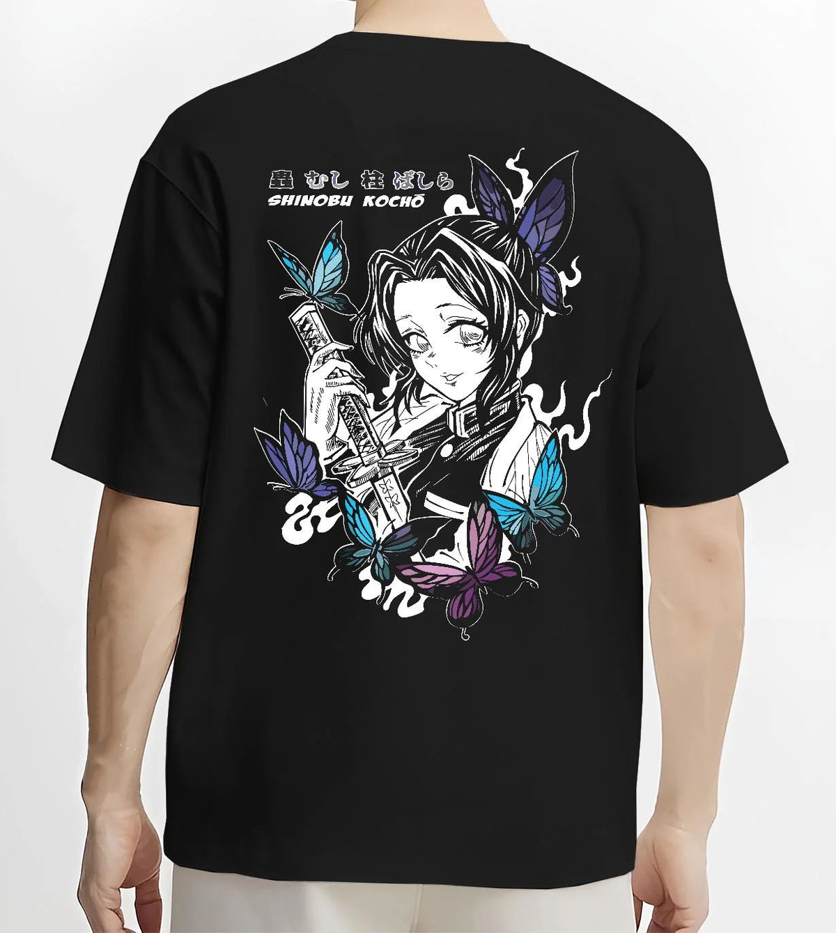 Black T-shirt worn by male model from the back featuring Shinobu Kocho poison butterfly Demon Slayer artwork.
