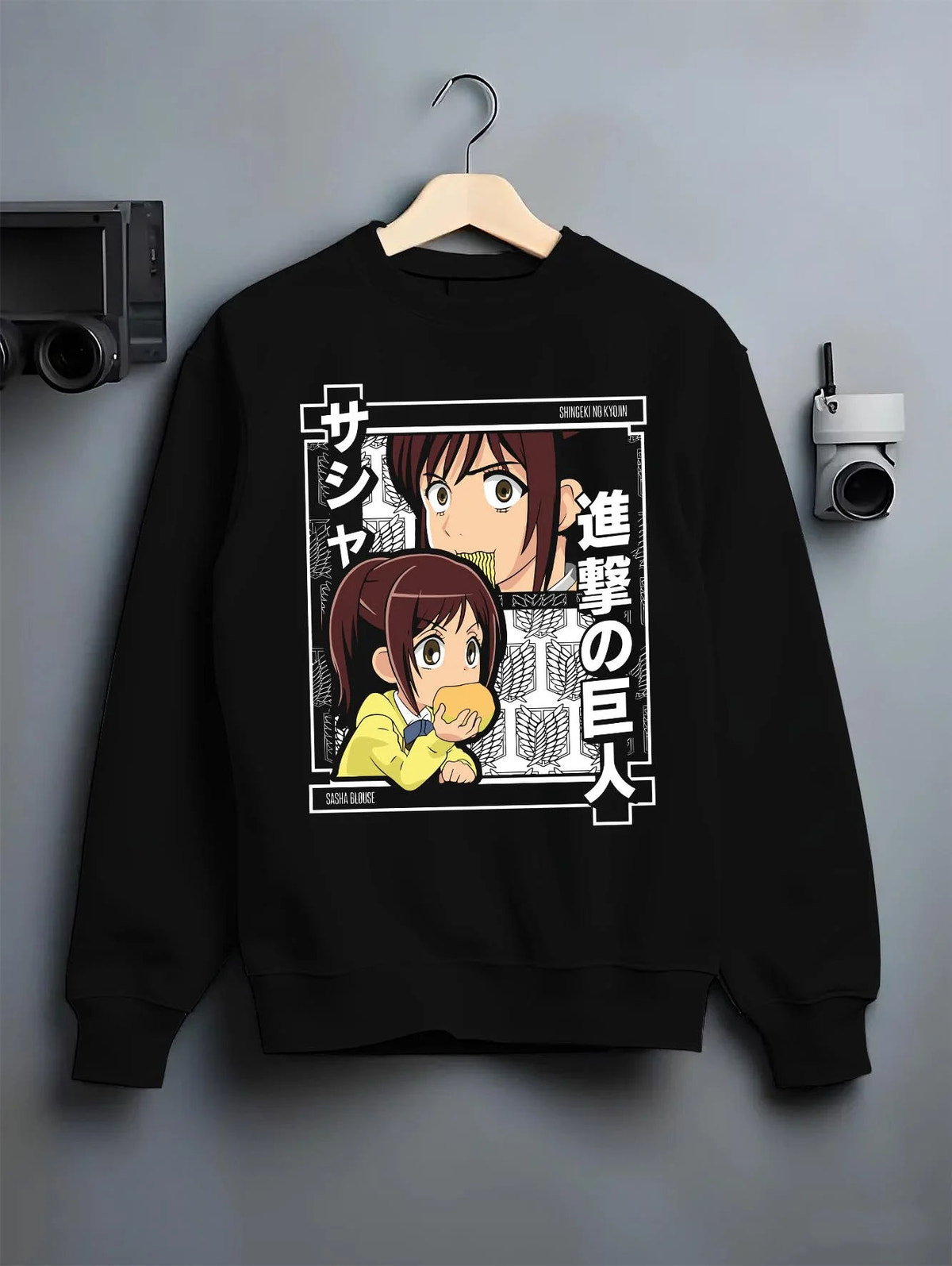 Black crewneck sweatshirt on hanger featuring Sasha Braus Potato Girl Attack on Titan artwork.