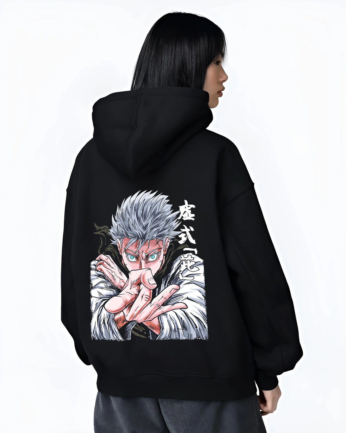 Black hoodie female model back view with Satoru Gojo in fighting pose from Jujutsu Kaisen illustrated back graphic