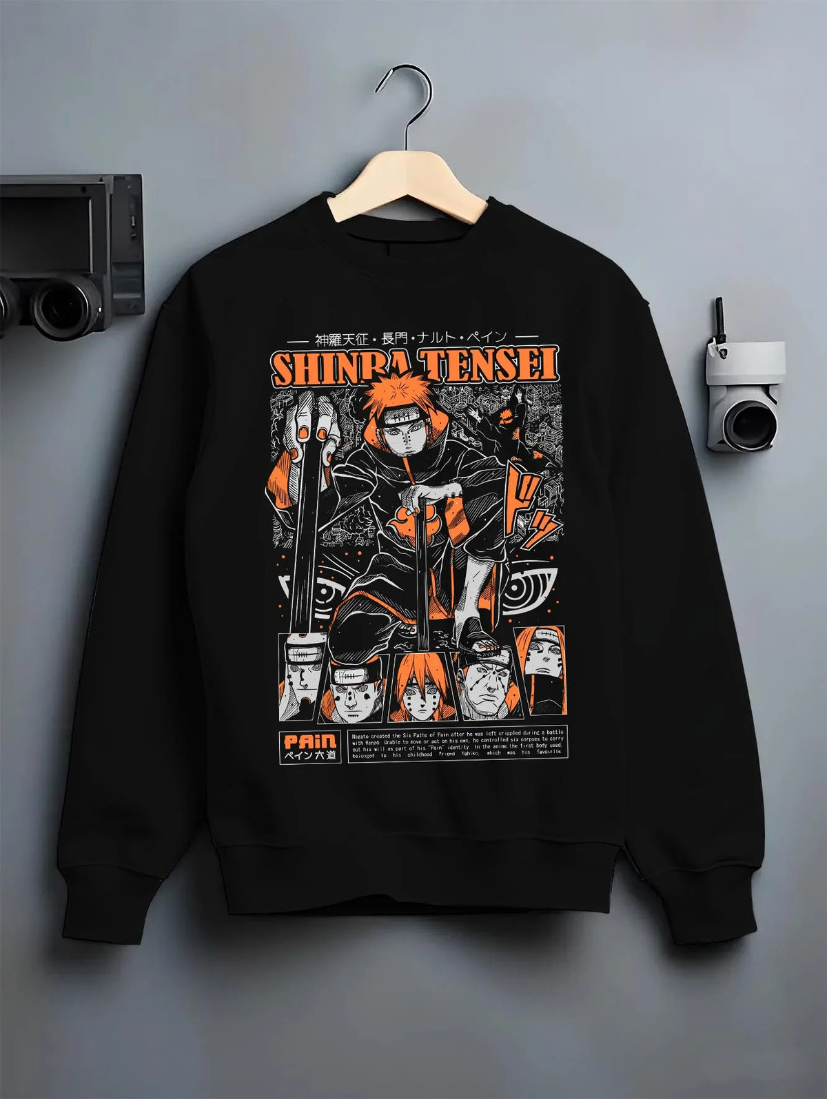 Black crewneck sweatshirt on hanger featuring Pain Shinra Tensei Almighty Push Naruto artwork.