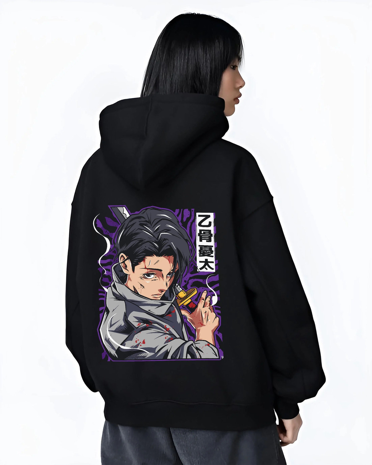 Black hoodie worn by female model from the back featuring Yuta Okkotsu cursed energy Jujutsu Kaisen artwork.