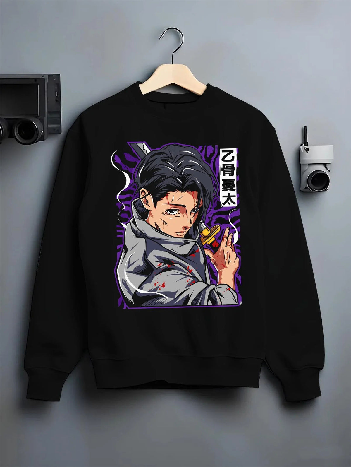 Black crewneck sweatshirt on hanger featuring Yuta Okkotsu cursed energy Jujutsu Kaisen artwork.