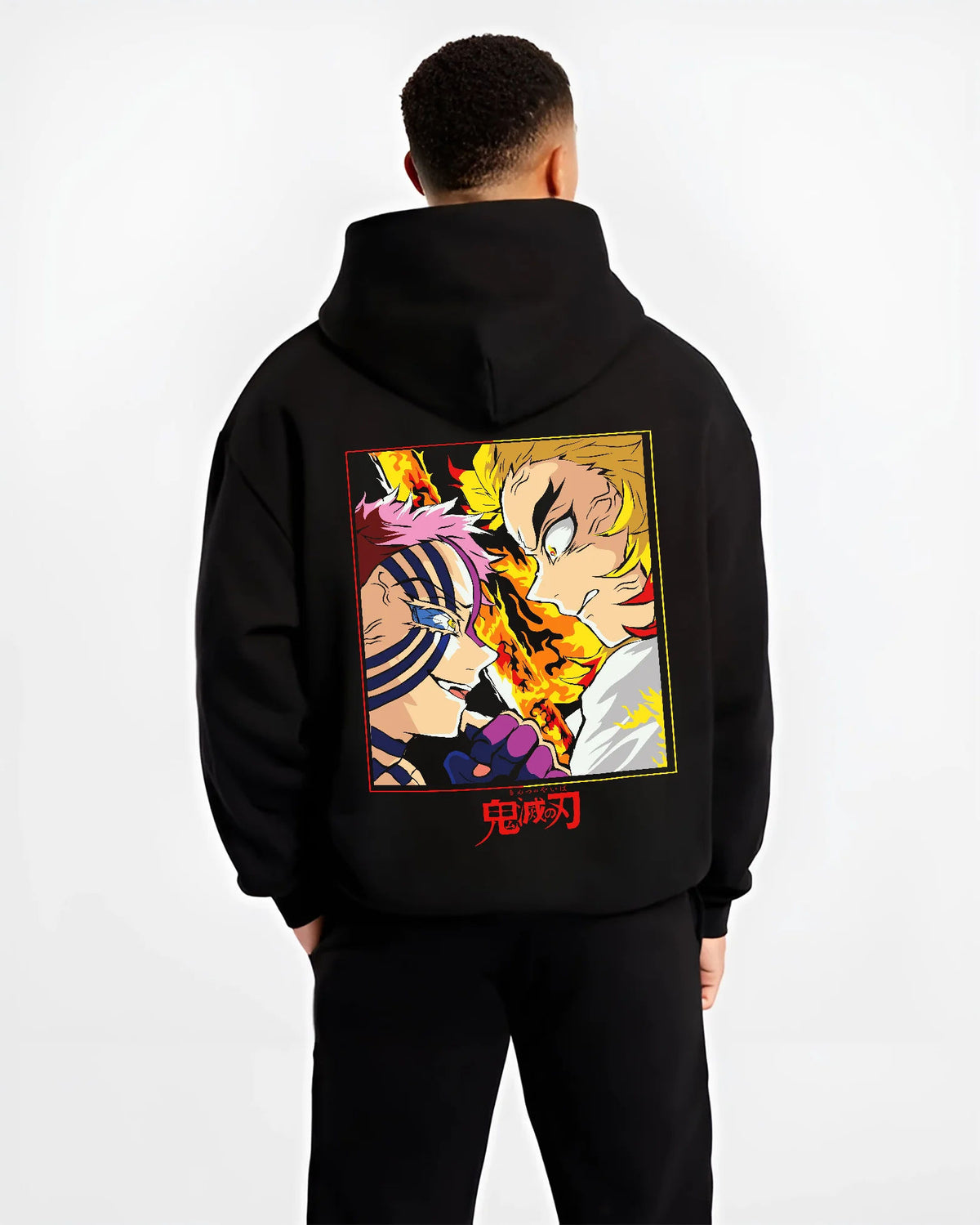 Black hoodie model back view showing Kyojuro Rengoku from Demon Slayer: flame sword and blaze