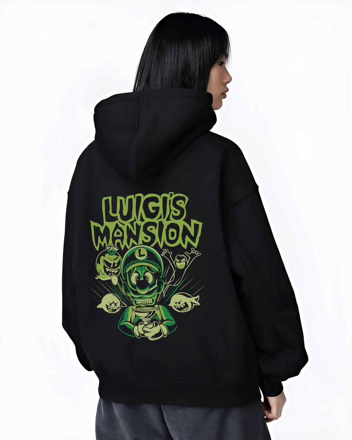 Black hoodie worn by female model from the back featuring Luigi ghost hunter Luigi's Mansion artwork.