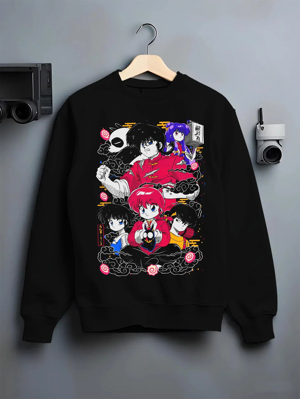 Black crewneck sweatshirt on hanger featuring Ranma 1/2 martial arts cast artwork.