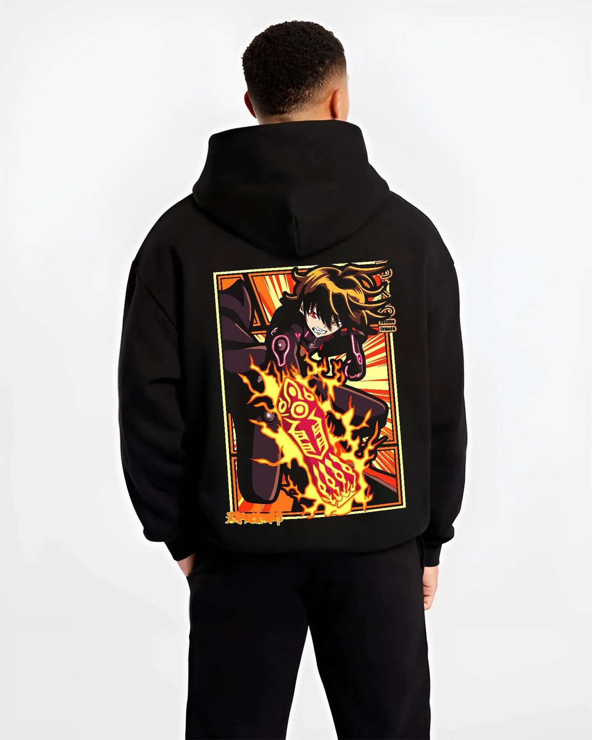 Black hoodie worn by male model from the back featuring Shinra Kusakabe Devil's Footprints Fire Force artwork.