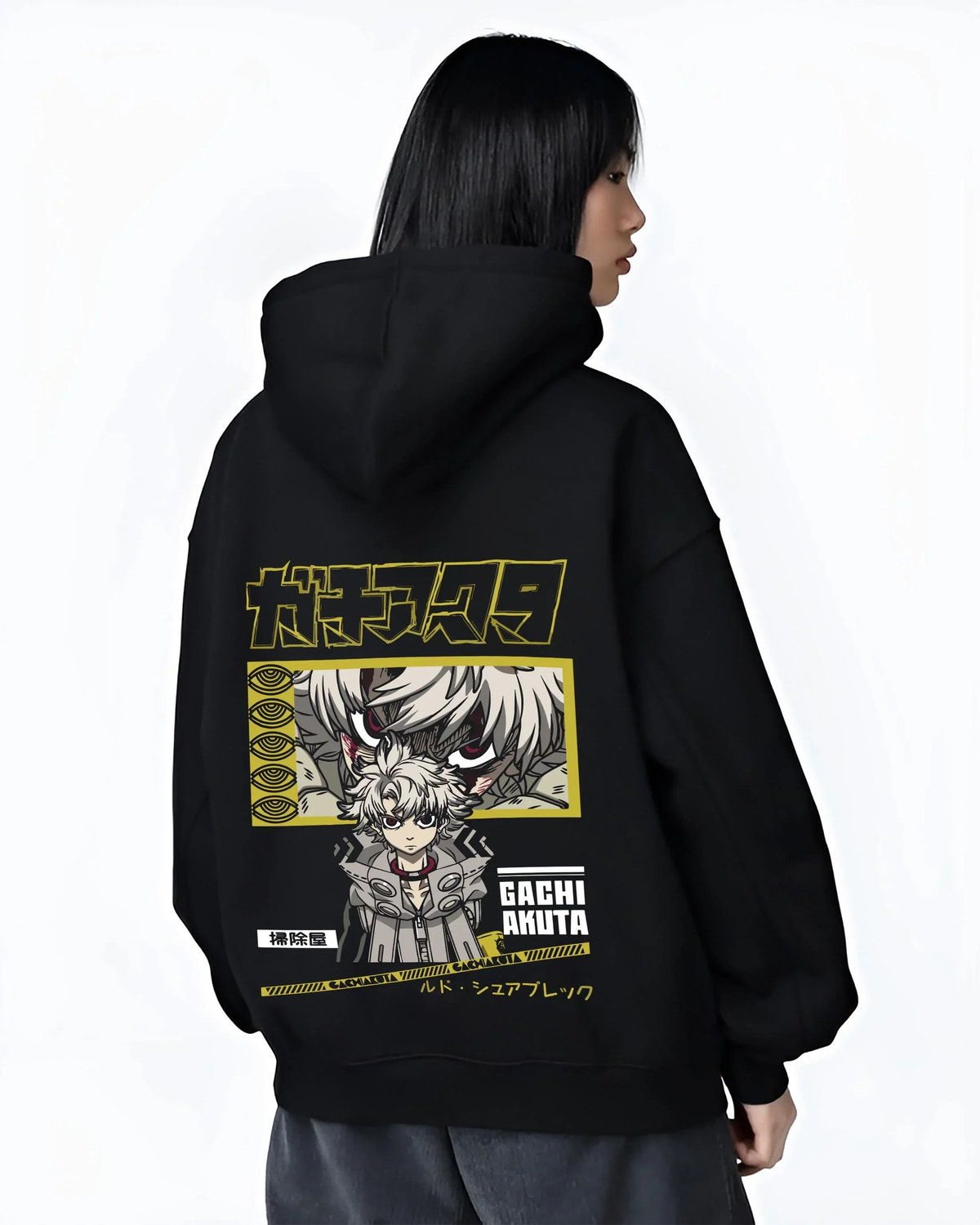 Black hoodie worn by female model, back view with Rudo Hoodie Gachiakuta Character Action Scene graphic premium wear.