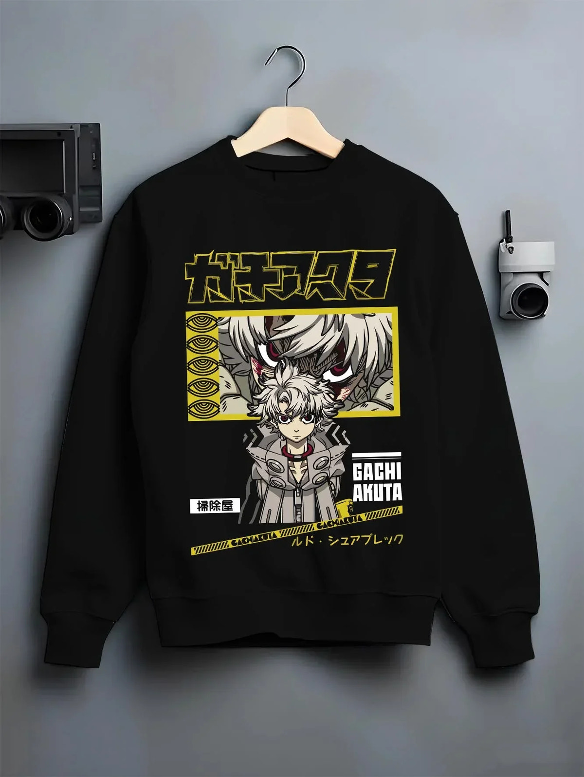 Black crewneck sweatshirt on hanger with Rudo Hoodie Gachiakuta Character Action Scene graphic premium wear.