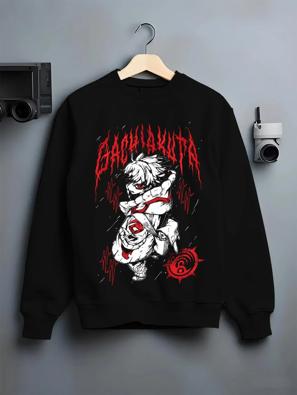 Black crewneck sweatshirt on hanger with Rudo Hoodie Gachiakuta Blood Red Special graphic streetwear graphic.