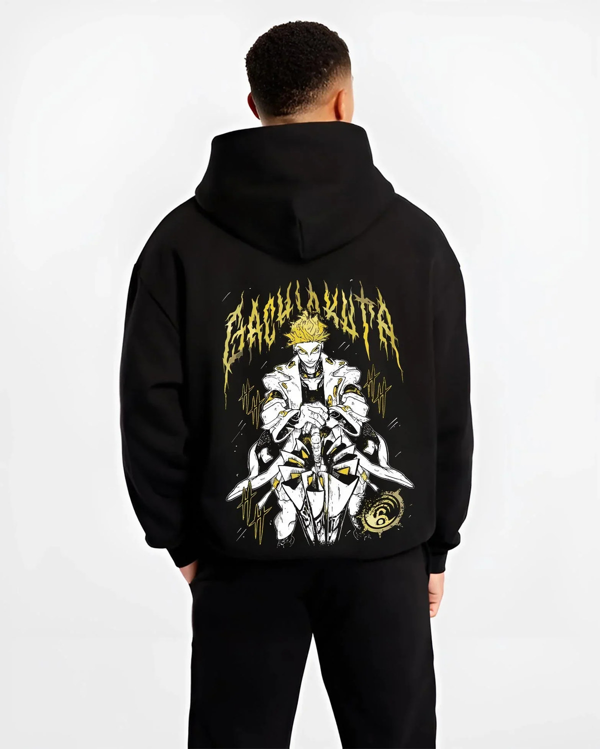 Black hoodie worn by male model, back view with Rudo Hoodie Gachiakuta Skeletal Yellow Art graphic Rudo themed artwork.