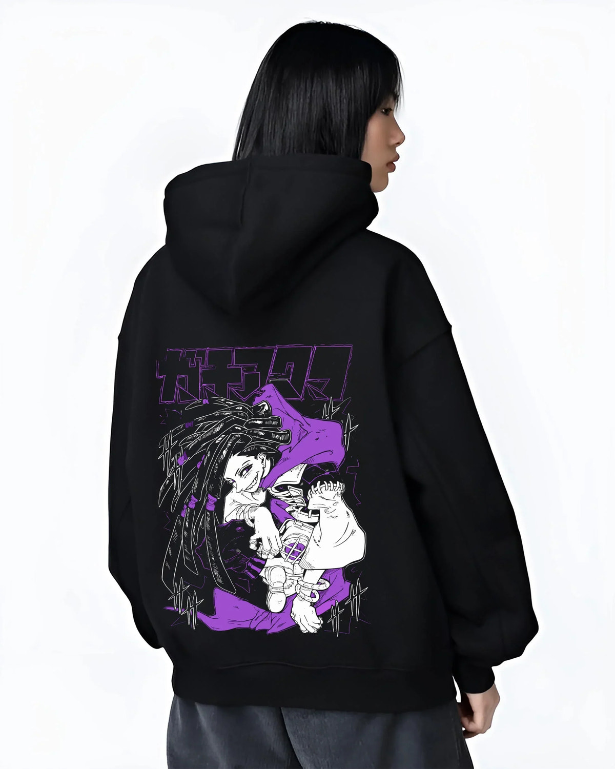 Black hoodie worn by female model, back view with Rudo Hoodie Gachiakuta Purple Dreadlock Form graphic bold anime graphic.