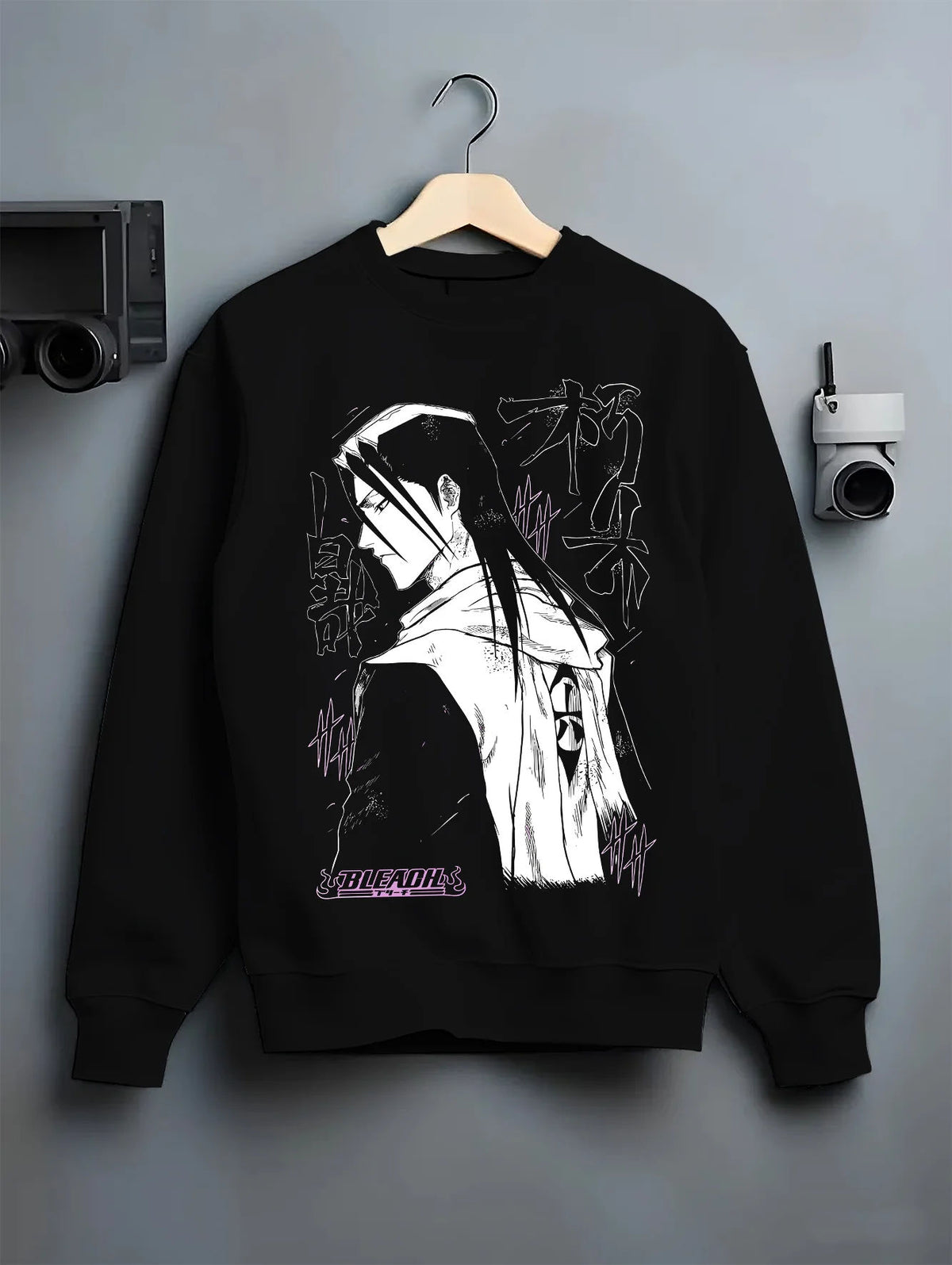 Black crewneck sweatshirt on hanger showing Rukia Kuchiki from Bleach: monochrome sword pose