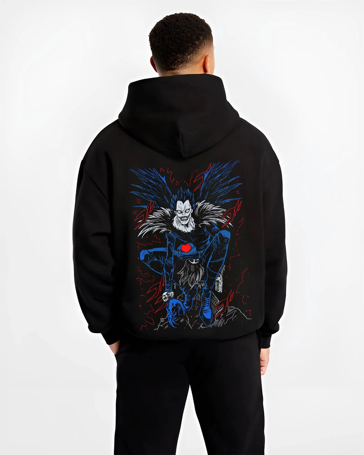 Black hoodie worn by male model from the back featuring Ryuk Shinigami apple Death Note artwork.