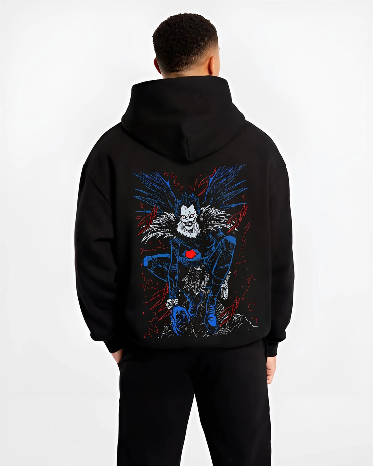 Black hoodie worn by male model from the back featuring Ryuk Shinigami apple Death Note artwork.