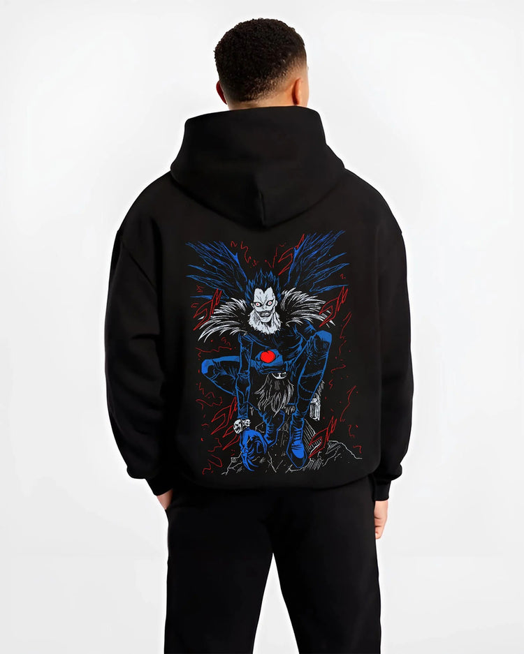 Black hoodie worn by male model from the back featuring Ryuk Shinigami apple Death Note artwork.
