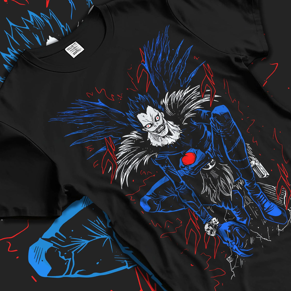 Black T-shirt laid flat with natural folds featuring Ryuk Shinigami apple Death Note artwork.
