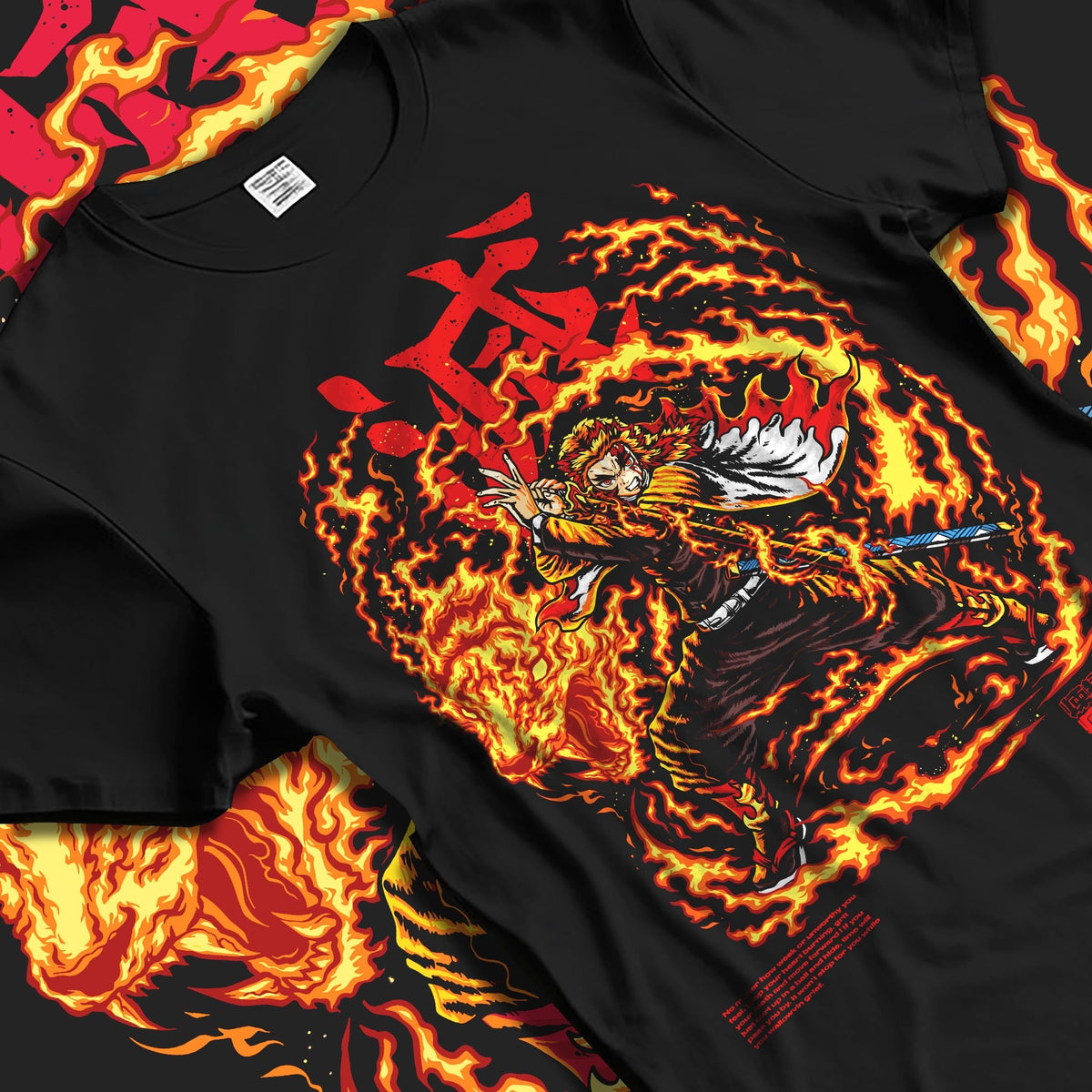 Black T-shirt laid flat with natural fabric folds, featuring Demon Slayer Rengoku anime poster inspired design with fiery flame aura and retro manga battle details.