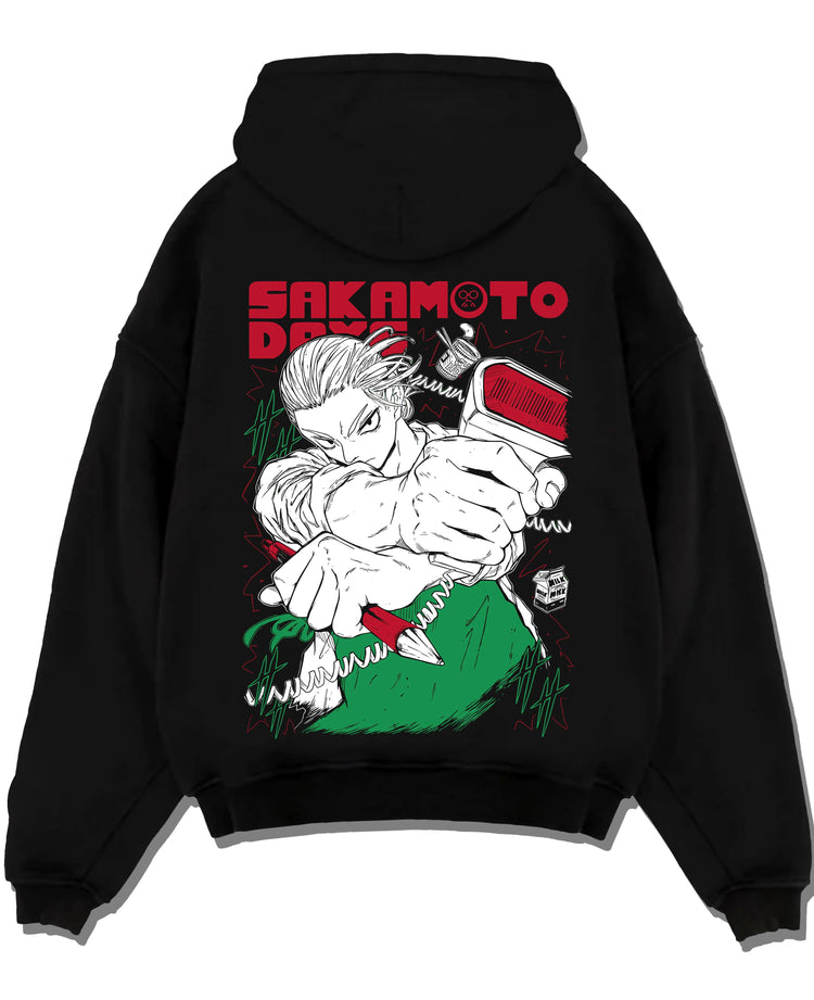 Black hoodie laid flat featuring Sakamoto Days cool assassin fight scene artwork.