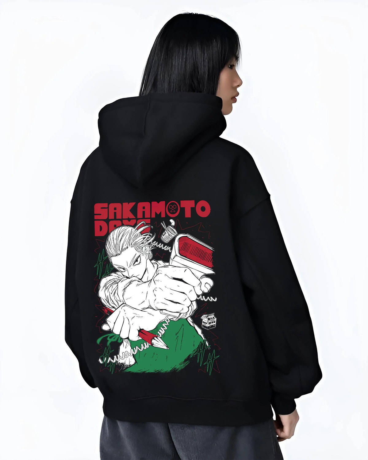 Black hoodie worn by female model from the back featuring Sakamoto Days cool assassin fight scene artwork.