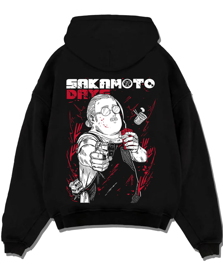 Black hoodie laid flat featuring Taro Sakamoto assassin street style Sakamoto Days artwork.