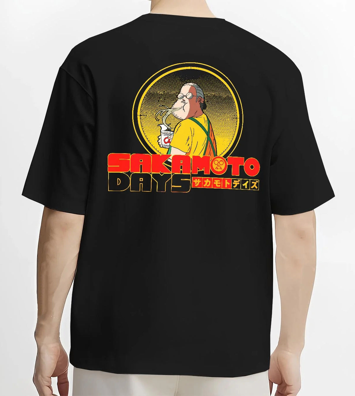 Black T-shirt worn by male model from the back featuring Sakamoto Days veteran assassin artwork.
