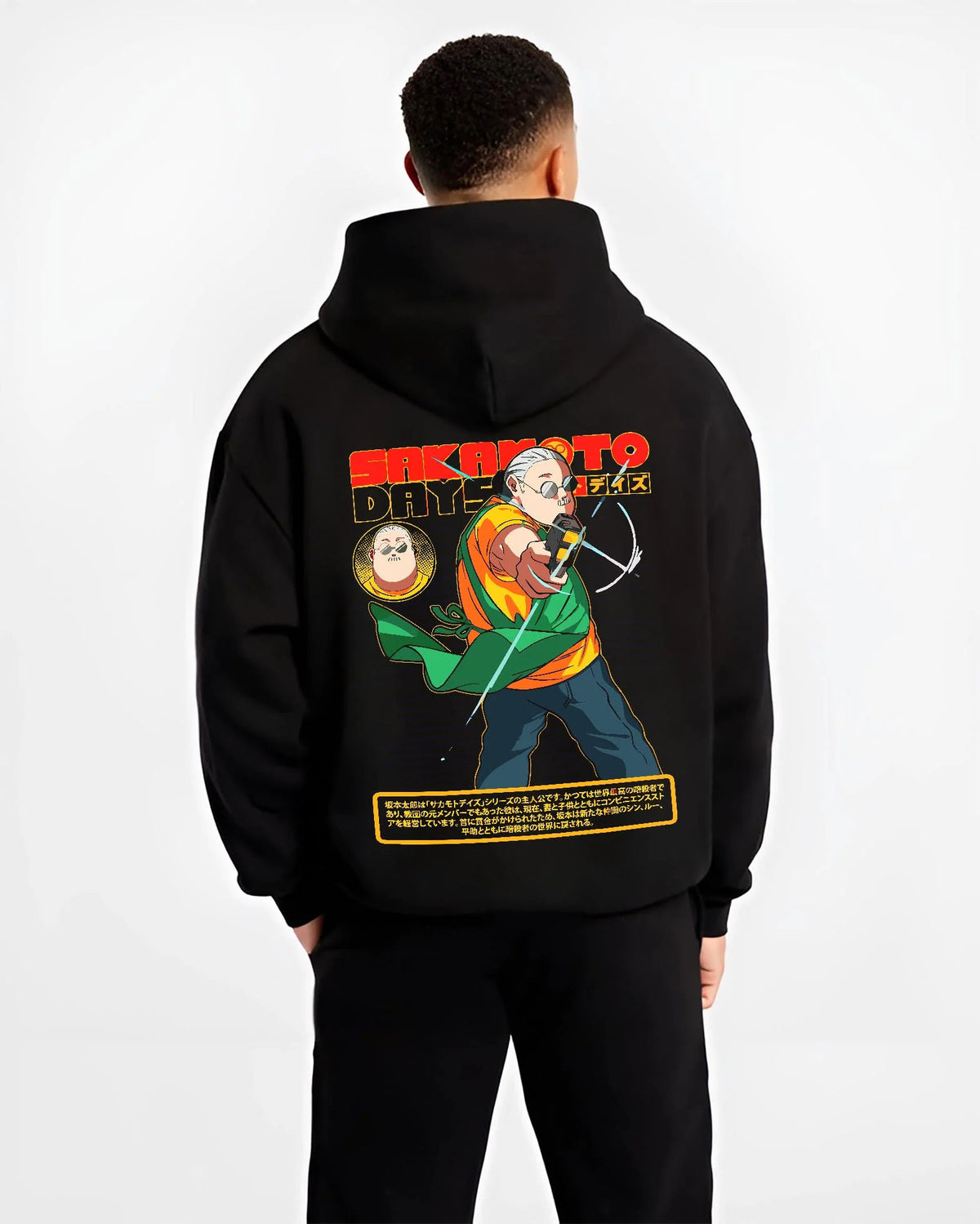 Black hoodie worn by male model from the back featuring Taro Sakamoto assassin battle Sakamoto Days artwork.