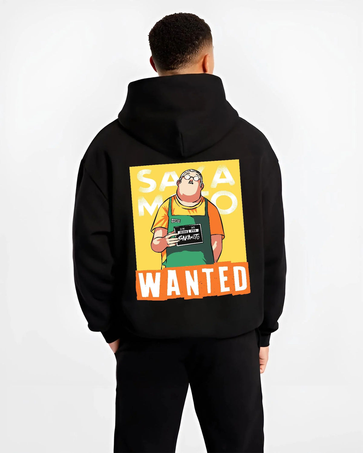 Black hoodie worn by male model from the back featuring Taro Sakamoto wanted poster Sakamoto Days artwork.