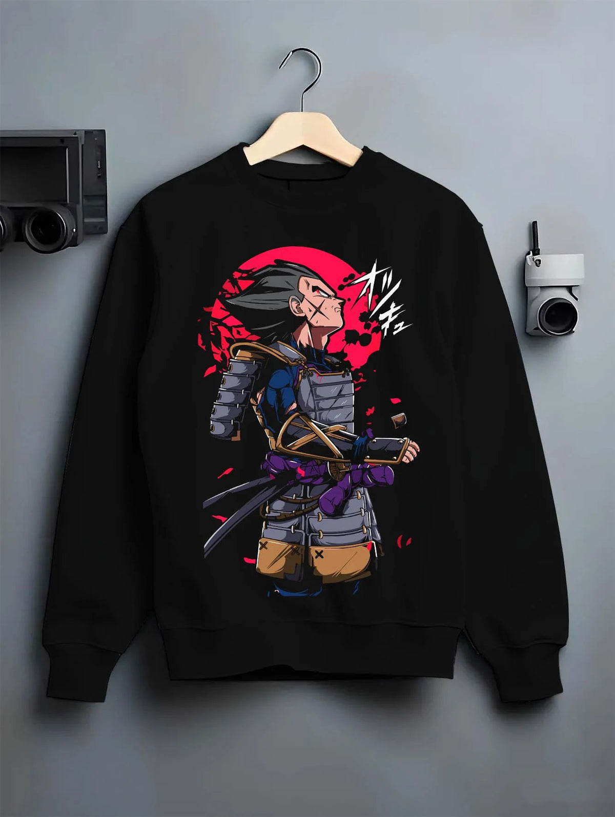 Black crewneck sweatshirt on hanger featuring Vegeta samurai armour Saiyan warrior Dragon Ball artwork.