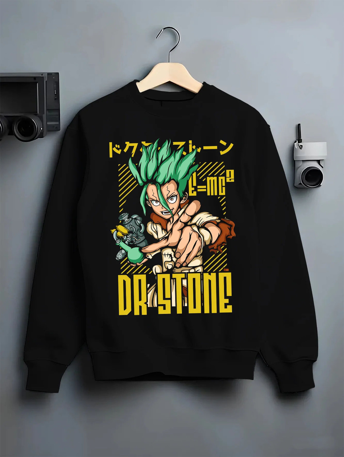 Black crewneck sweatshirt on hanger showing Senku Ishigami from Dr Stone: electric green illustration