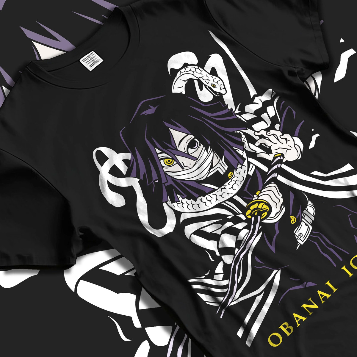 Black T-shirt laid flat with natural folds featuring Obanai Iguro Serpent Breathing snake Demon Slayer artwork.