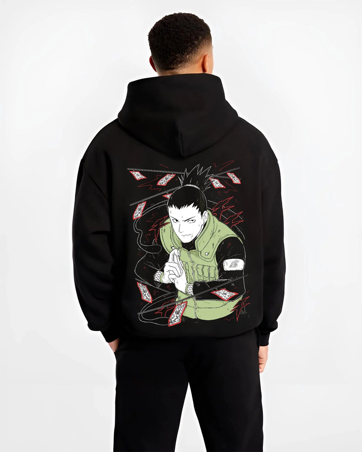 Black hoodie worn by male model from the back featuring Shikamaru Nara Shadow Possession Jutsu Naruto artwork.