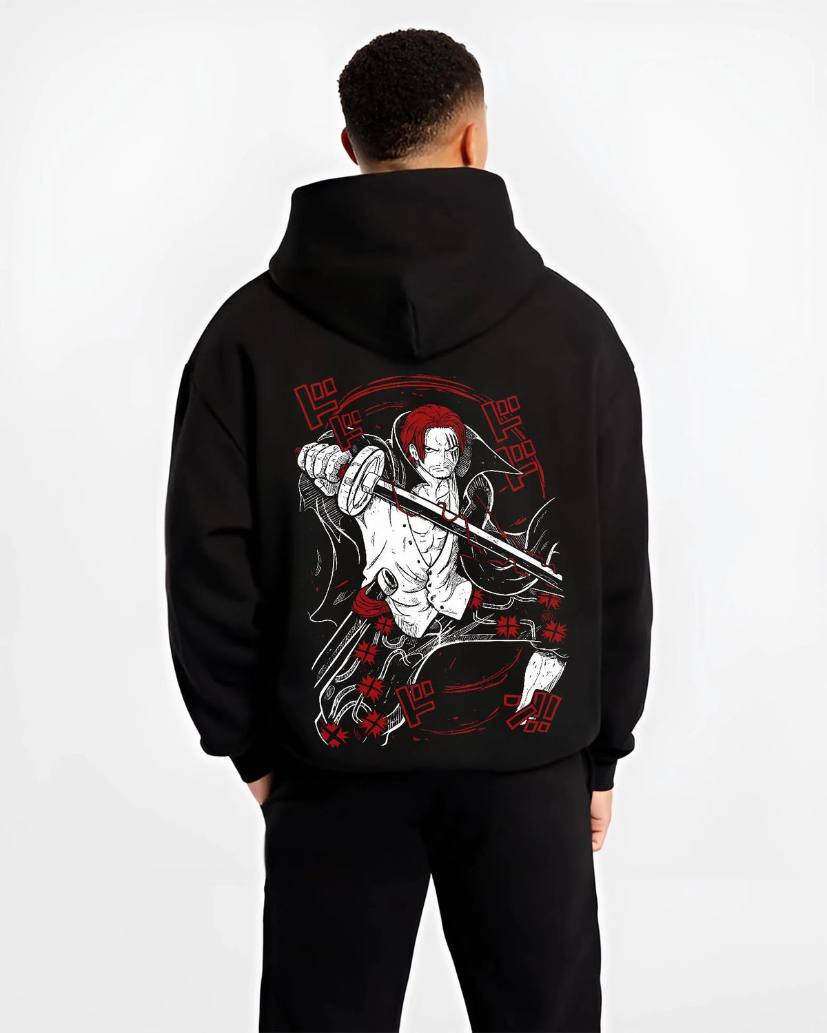 Black hoodie worn by male model from the back featuring Shanks Red Hair Emperor Haki One Piece artwork.