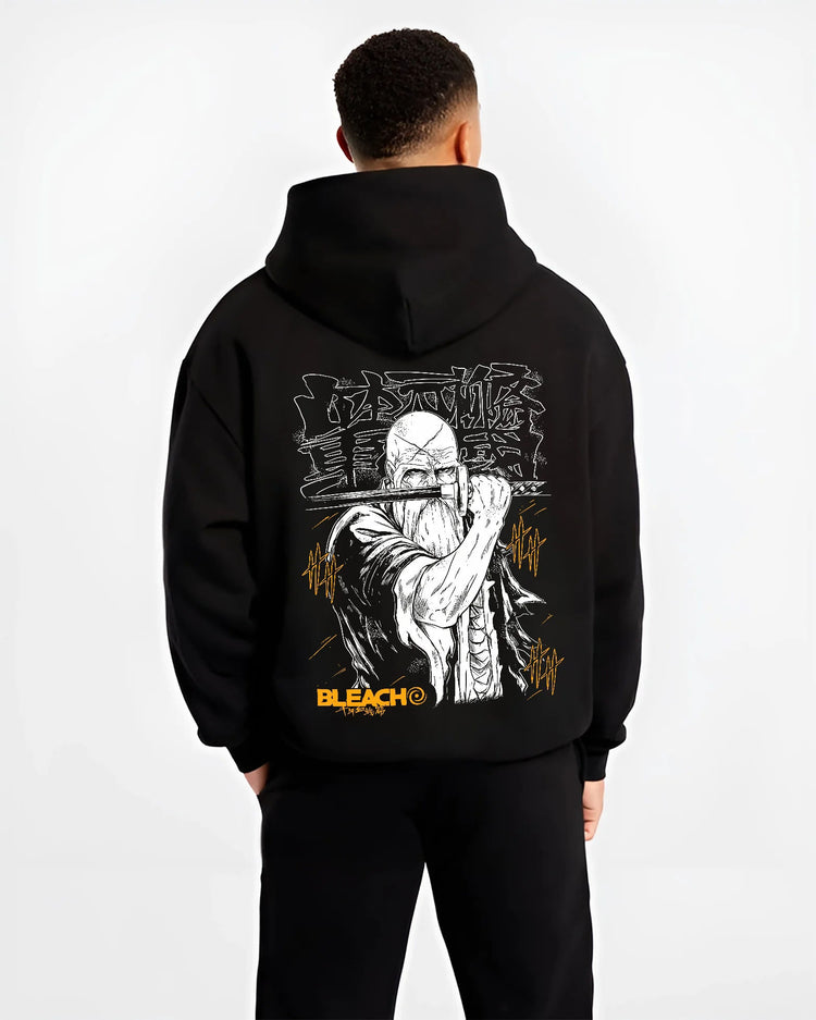 Black hoodie model back view showing Genryusai Shigekuni Yamamoto from Bleach: First Division Captain