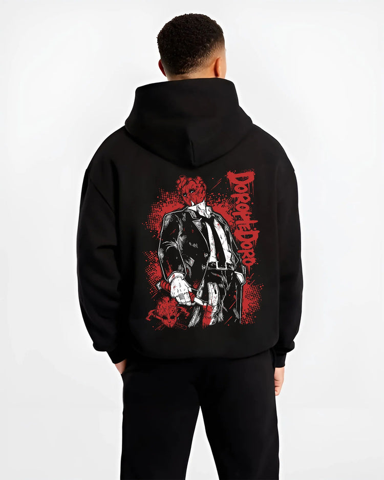 Black hoodie model back view showing Shin from Dorohedoro: suit, red mask and hammer