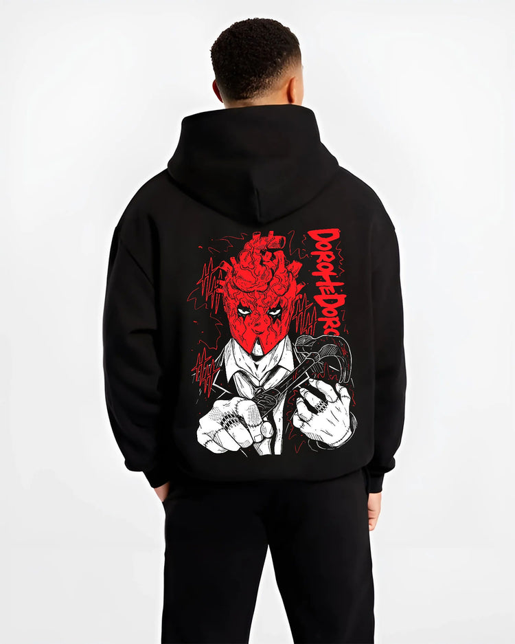 Black hoodie model back view showing Shin from Dorohedoro: red heart mask and hammer