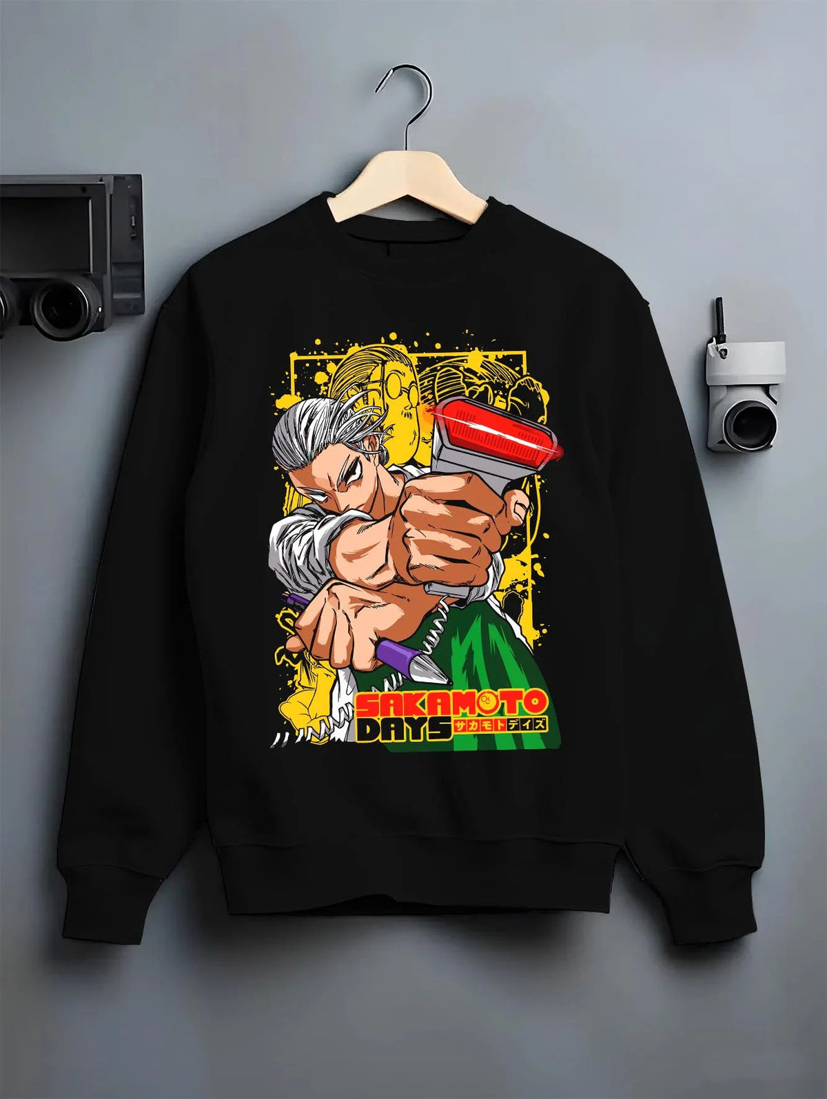 Black crewneck sweatshirt on hanger featuring Taro Sakamoto slim assassin battle Sakamoto Days artwork.