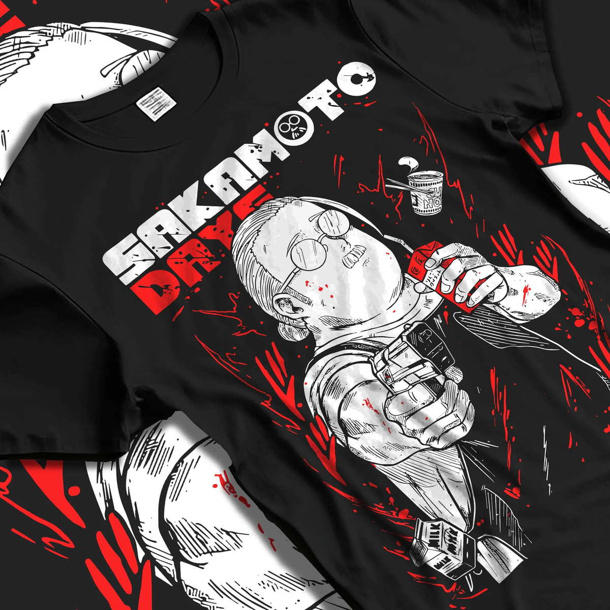 Black T-shirt laid flat with natural folds featuring Taro Sakamoto sketch hitman Sakamoto Days artwork.