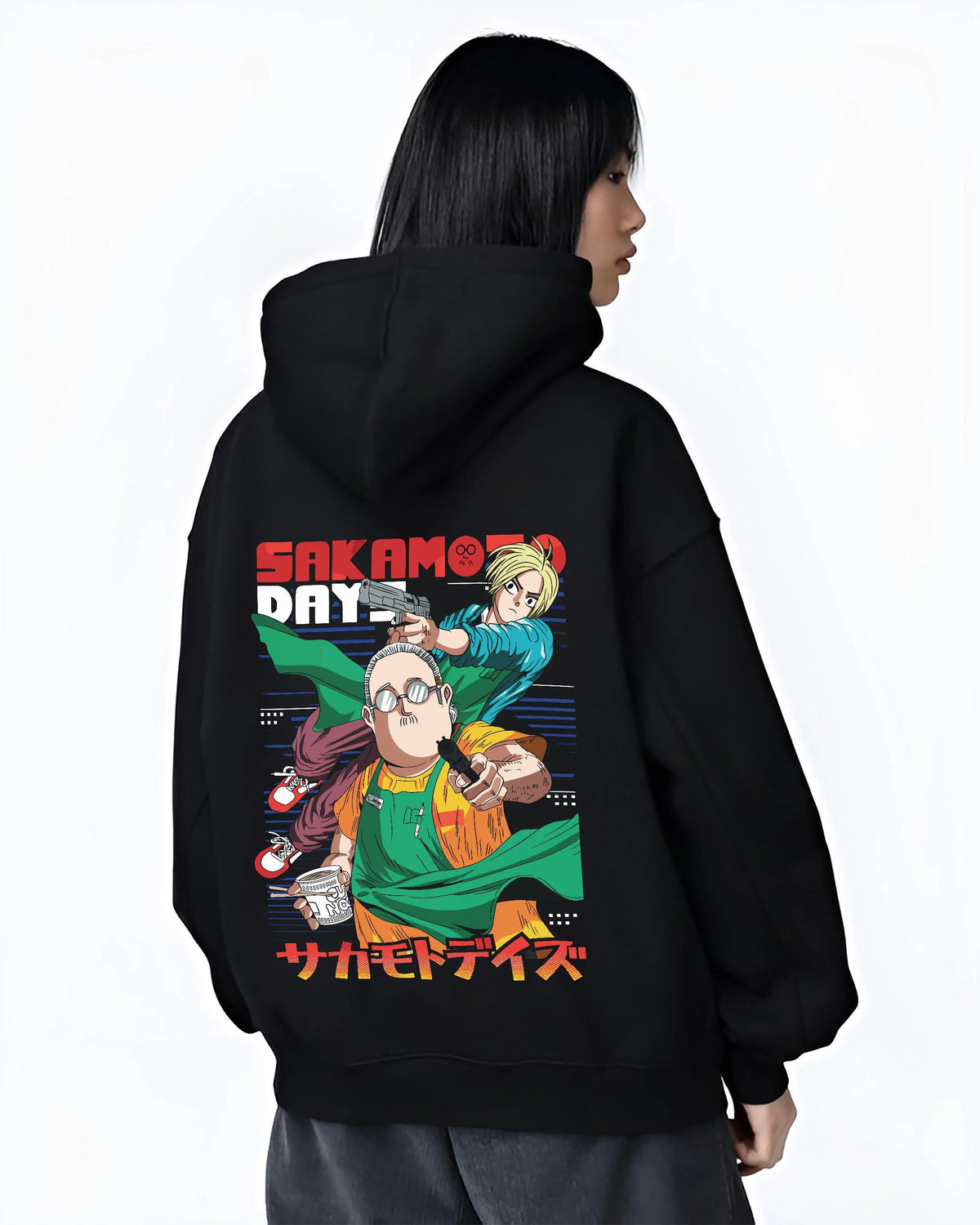 Black hoodie worn by female model from the back featuring Sakamoto Days assassin cast group artwork.