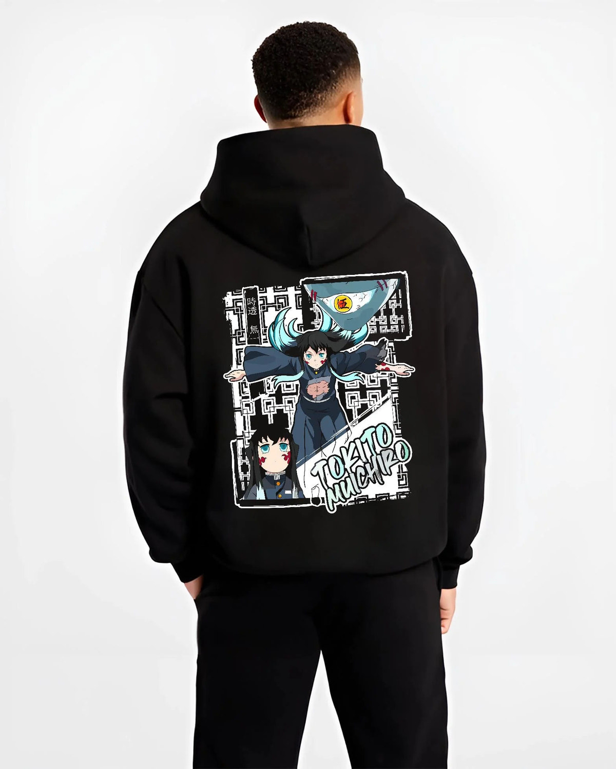 Black hoodie worn by male model from the back featuring Muichiro Tokito Mist Hashira sword Demon Slayer artwork.