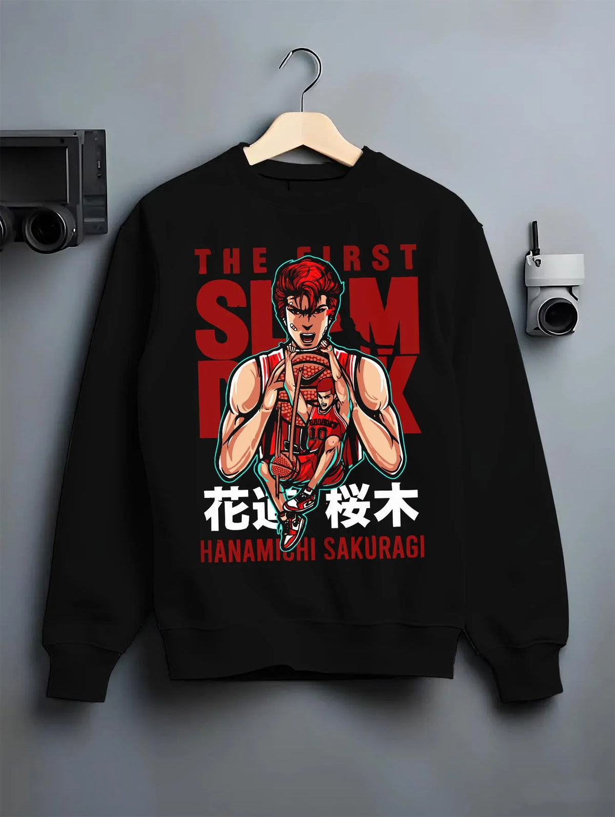 Black crewneck sweatshirt on hanger featuring Hanamichi Sakuragi Shohoku basketball Slam Dunk artwork.