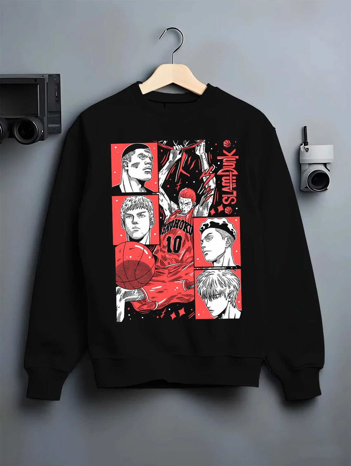 Black crewneck sweatshirt on hanger featuring Shohoku basketball team Slam Dunk artwork.