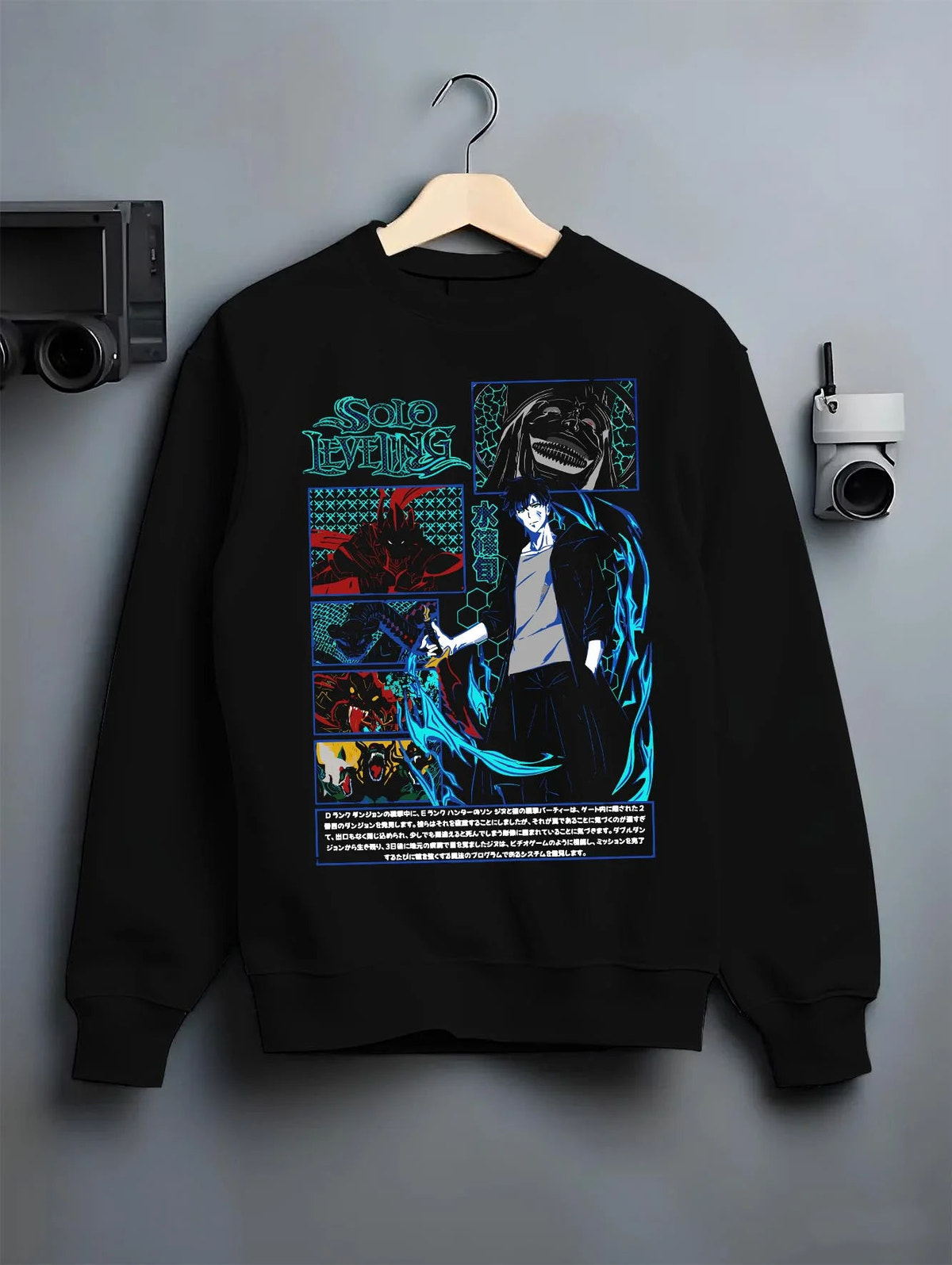 Black crewneck sweatshirt on hanger featuring Sung Jin-Woo ice shadow battle Solo Leveling artwork.