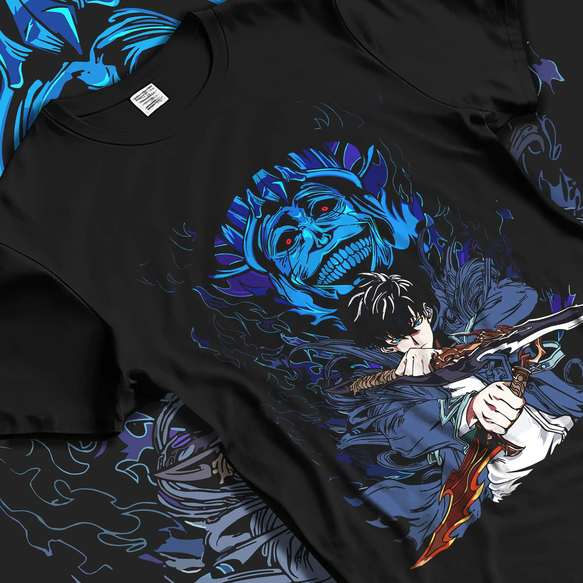 Black T-shirt laid flat with natural folds featuring Sung Jin-Woo Shadow Monarch sword Solo Leveling artwork.