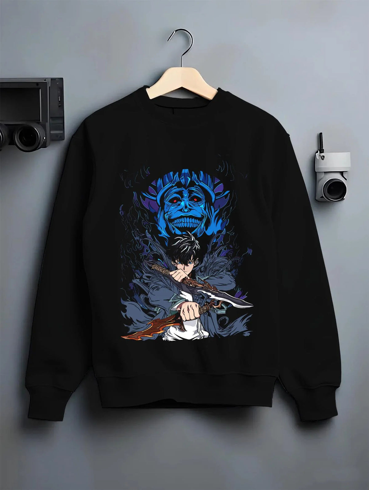 Black crewneck sweatshirt on hanger featuring Sung Jin-Woo Shadow Monarch sword Solo Leveling artwork.