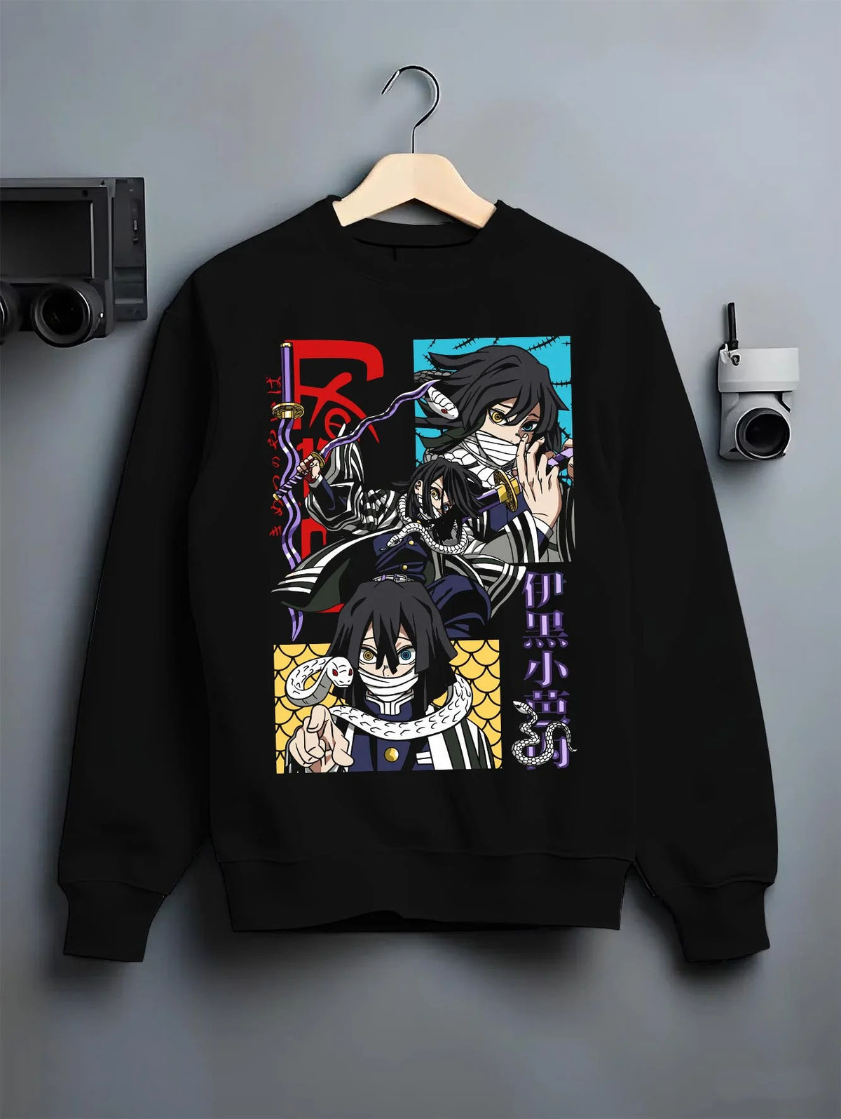 Black crewneck sweatshirt on hanger featuring Obanai Iguro Snake Pillar serpent Demon Slayer artwork.