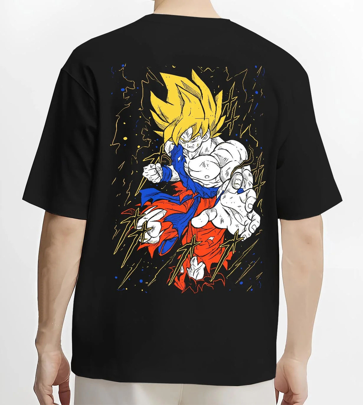 Black T-shirt worn by male model from the back featuring Goku Super Saiyan battle power Dragon Ball Z artwork.