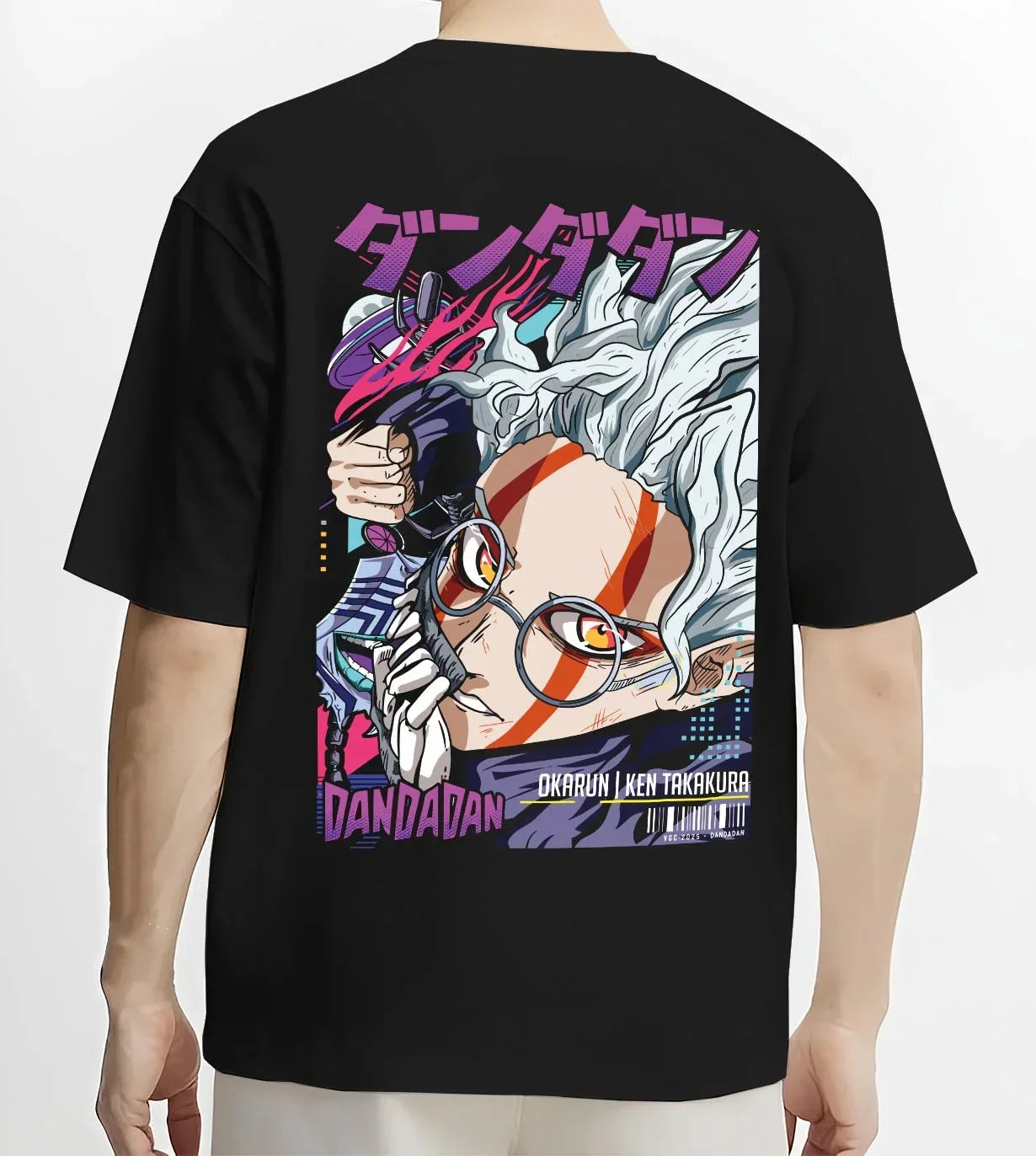 Black T-shirt worn by male model, back view with Ken Takakura Hoodie Dandadan Dynamic Fight Scene graphic bold anime graphic.