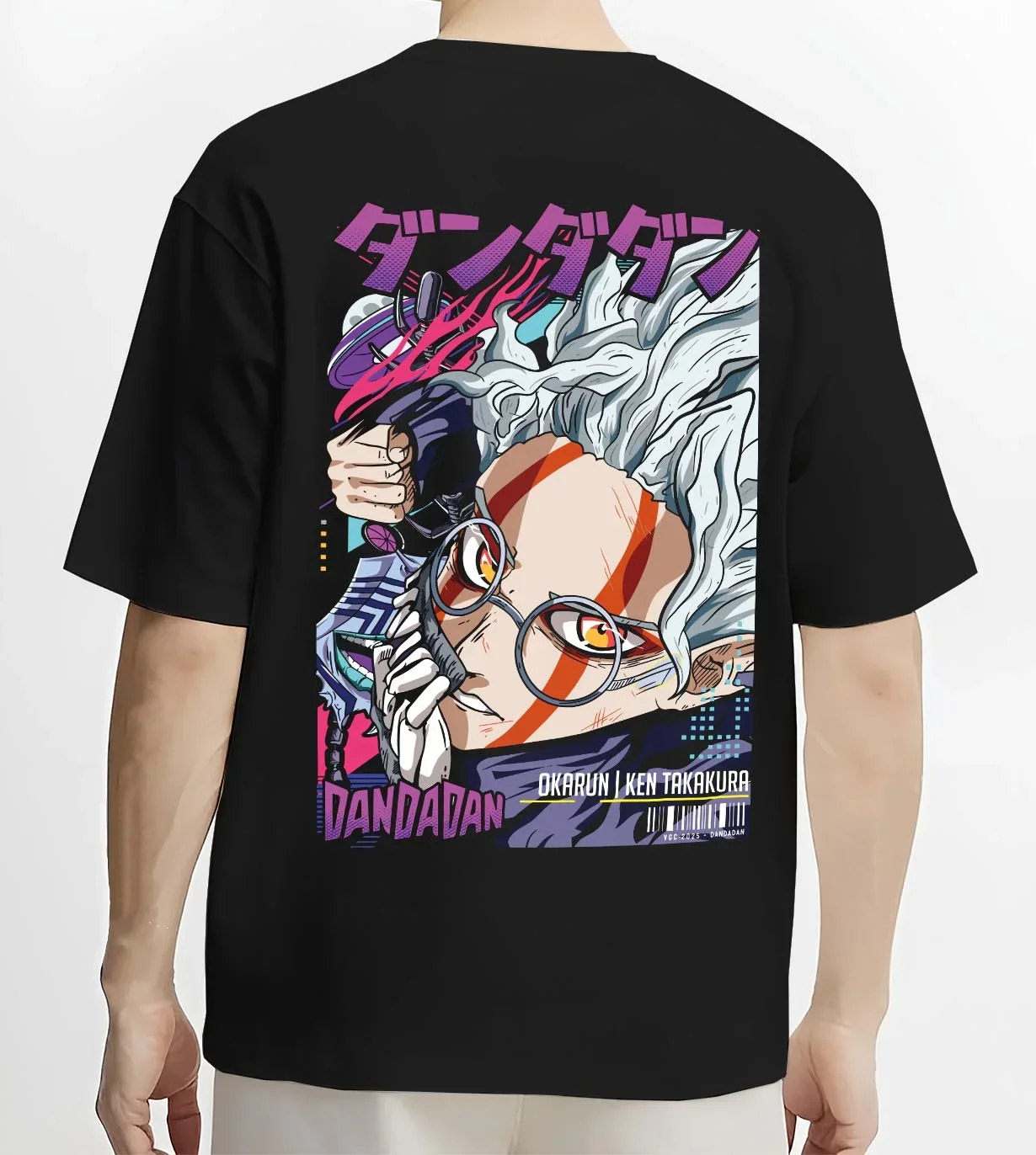 Black T-shirt worn by male model, back view with Ken Takakura Hoodie Dandadan Dynamic Fight Scene graphic bold anime graphic.