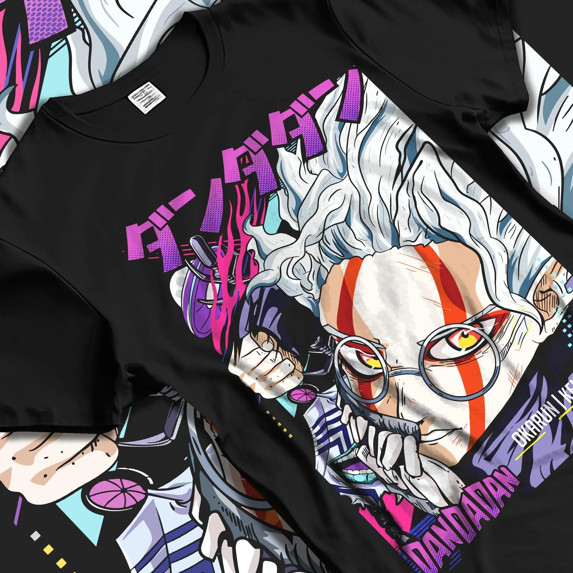 Black T-shirt laid flat with natural folds with Ken Takakura Hoodie Dandadan Dynamic Fight Scene graphic streetwear graphic.