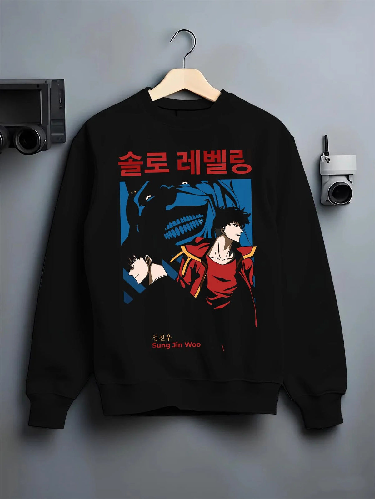 Black crewneck sweatshirt on hanger featuring Sung Jin-Woo shadow beast hunter Solo Leveling artwork.